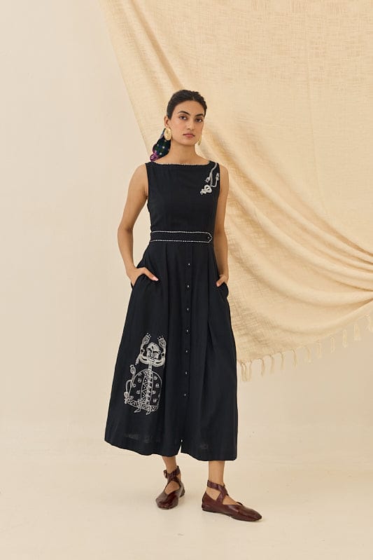 JODI Jugnu handloom dress featuring vibrant traditional woven fabric and intricate patterns, displayed on a hanger.