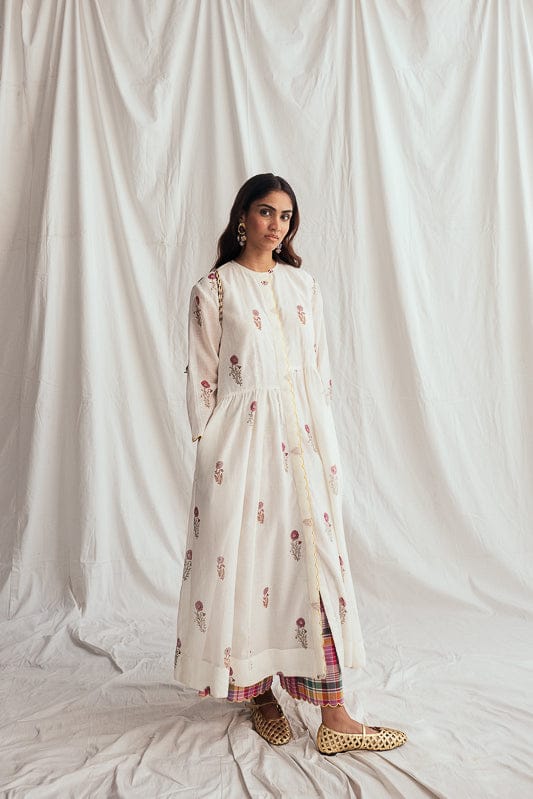 JODI Kulfi day dress, lightweight cotton dress with intricate embroidery, casual summer wear for women, shown on model.