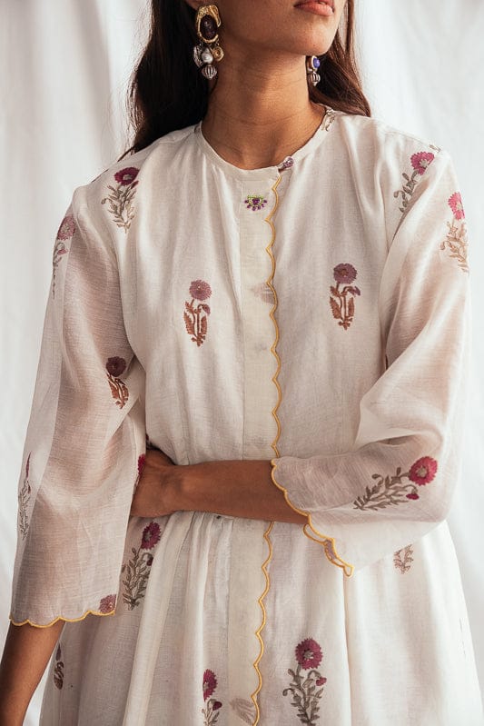 JODI Kulfi day dress featuring vibrant, patterned fabric with a relaxed fit and stylish neckline, perfect for casual wear.