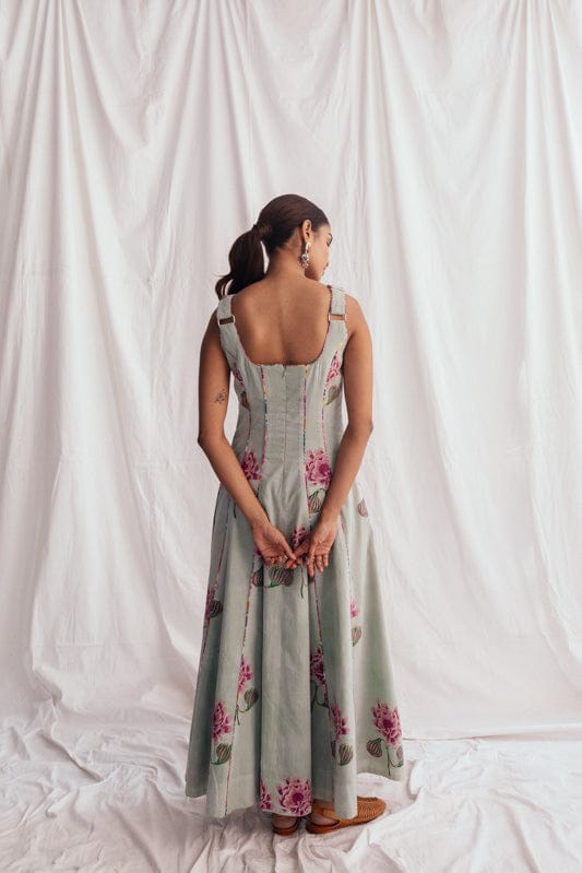 JODI Gulkand panel dress featuring vibrant floral patterns and elegant styling, displayed on a model.