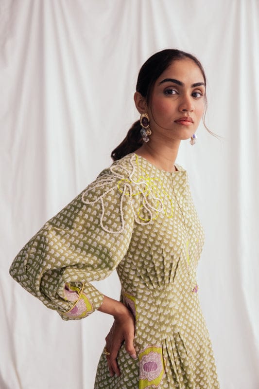 JODI Panna dress displayed on a model, featuring a flowing design and elegant fabric, perfect for casual or semi-formal wear.