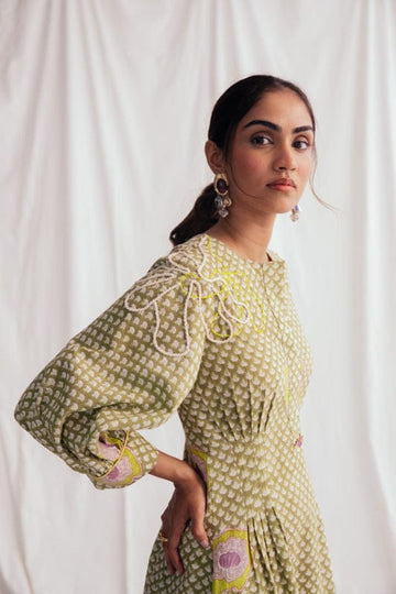 JODI Panna dress displayed on a model, featuring a flowing design and elegant fabric, perfect for casual or semi-formal wear.
