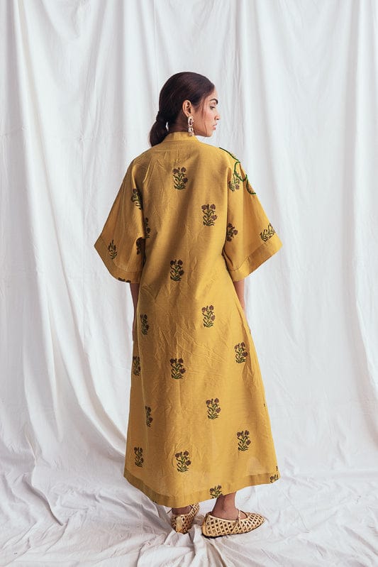 Nimbu silk day dress by JODI featuring a flowing silhouette and elegant design, shown in a light, vibrant fabric.