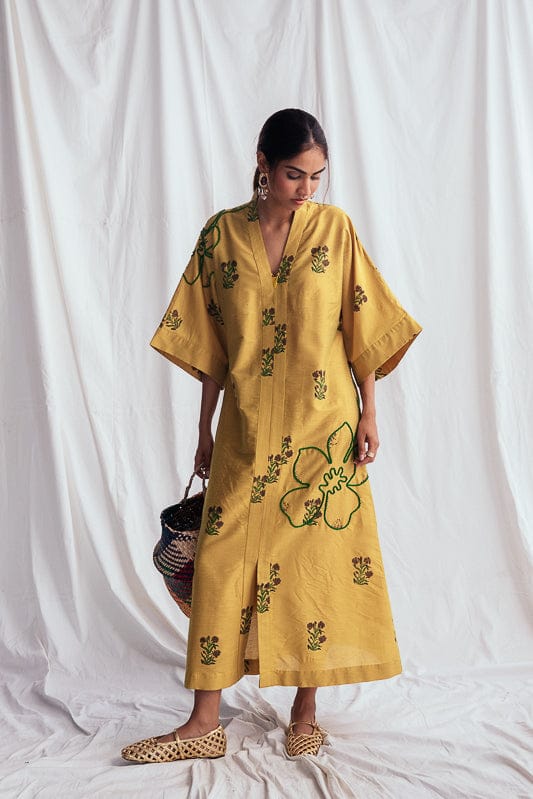 Nimbu silk day dress by JODI featuring a stylish, flowing design with intricate patterns, perfect for casual or semi-formal wear.