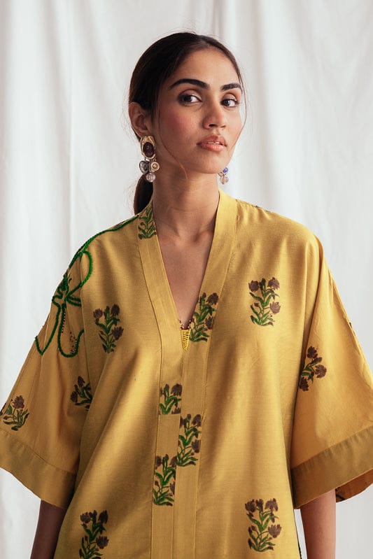 Nimbu silk day dress by JODI in soft, flowing fabric with elegant drape and a stylish neckline, perfect for daytime wear.