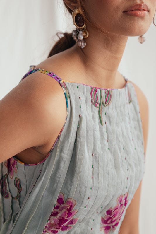 JODI Gulkand day dress featuring vibrant floral print and flowy fabric, perfect for casual or summer wear.