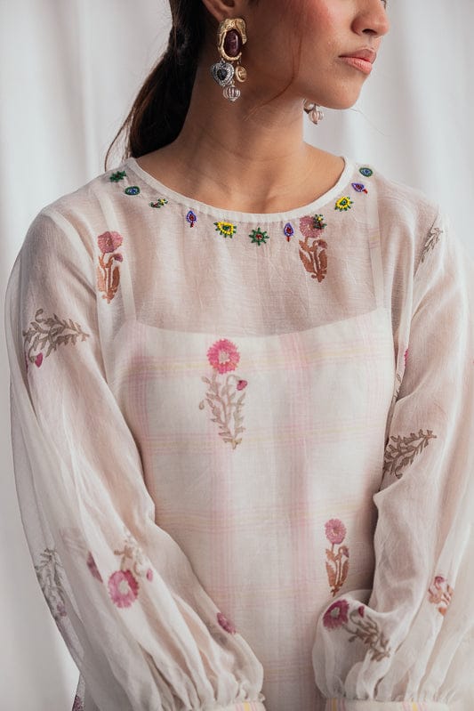 JODI Kulfi peasant dress featuring flowy fabric, boho style, and intricate embroidery, ideal for casual or summer wear.