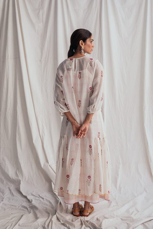JODI Kulfi peasant dress featuring bohemian style, flowing fabric, and intricate embroidery, perfect for casual or festive wear.