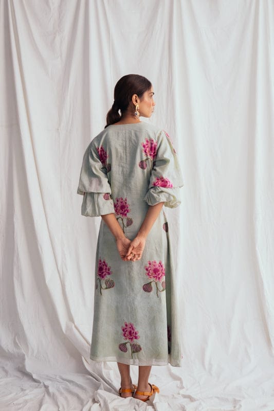JODI Gulkand dress featuring intricate embroidery and flowing fabric, displayed on a model in a fashion lookbook setting.