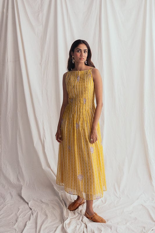 JODI Dhoop day dress, lightweight bohemian-style dress with floral patterns and relaxed fit, suitable for casual wear.