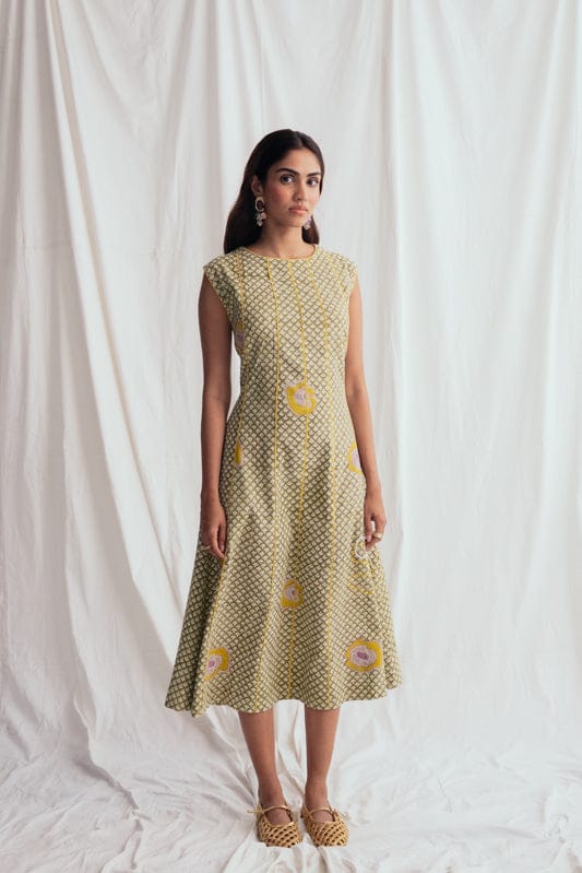 JODI panna panel dress featuring a flowing design with panna panels, perfect for stylish and elegant occasions.