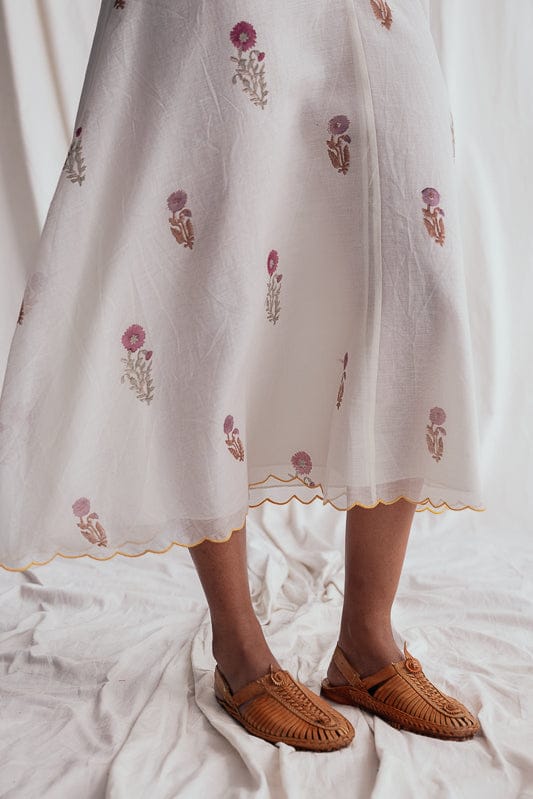 JODI Kulfi dress with vibrant floral print, lightweight fabric, and elegant design perfect for summer or casual occasions.