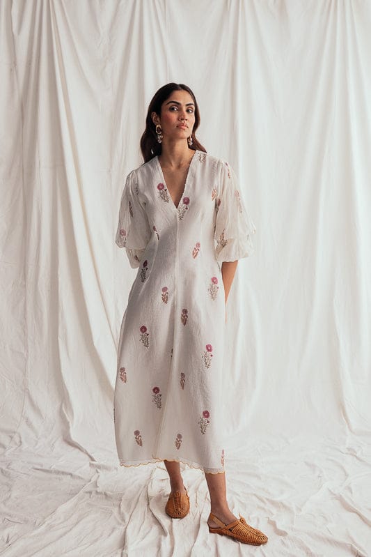 JODI Kulfi dress featuring vibrant, patterned fabric with traditional design and elegant fit, perfect for festive occasions.