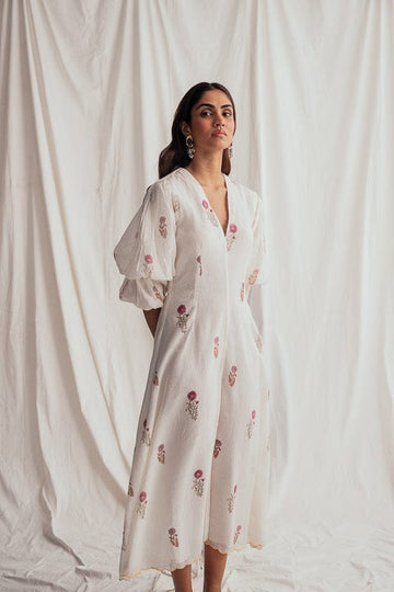 JODI Kulfi dress showcasing vibrant, flowing fabric with intricate patterns and elegant design, perfect for stylish occasions.