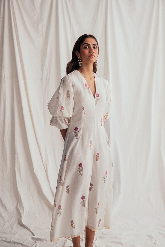 JODI Kulfi dress showcasing vibrant, flowing fabric with intricate patterns and elegant design, perfect for stylish occasions.