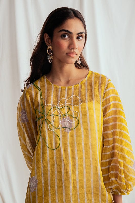 JODI Dhoop peasant dress with flowing fabric, boho style, featuring a relaxed fit and intricate detailing, perfect for casual wear.