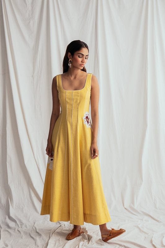 JODI Aamras handloom dress with vibrant traditional patterns and flowing fabric, stylishly displayed on a model.