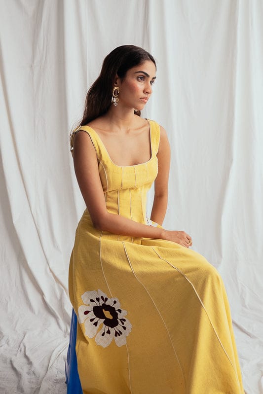 JODI Aamras handloom dress in vibrant colors, showcasing traditional fabric and elegant design, worn by a model.