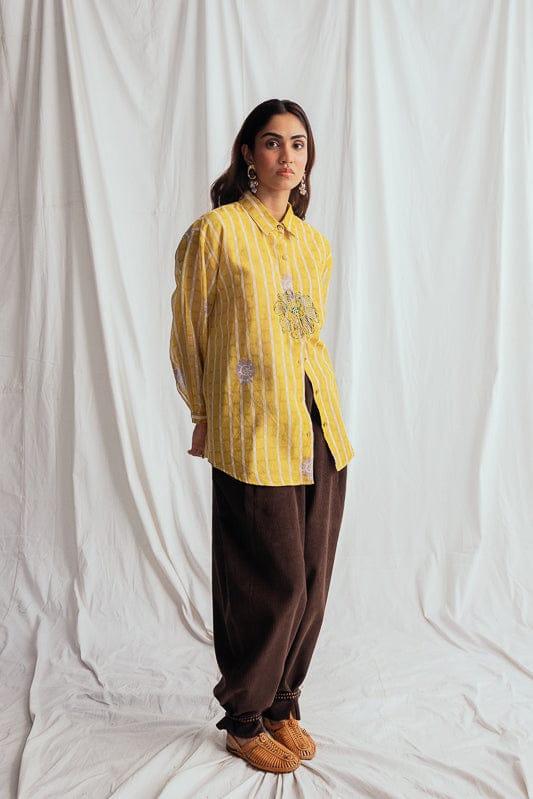JODI Dhoop shirt featuring a casual fit with a stylish design, displayed on a model with neutral background.