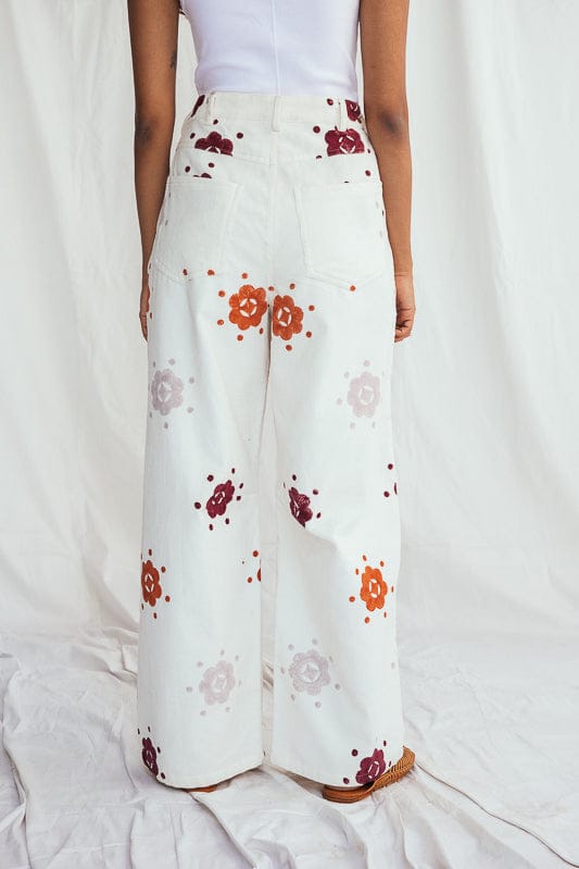 JODI Thandai corduroy trousers in a relaxed fit, featuring textured fabric and classic design, on a model.