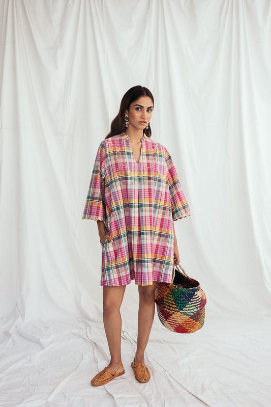 JODI Sherbet shift dress displayed on a model, featuring a relaxed fit and vibrant color for casual and semi-formal occasions.
