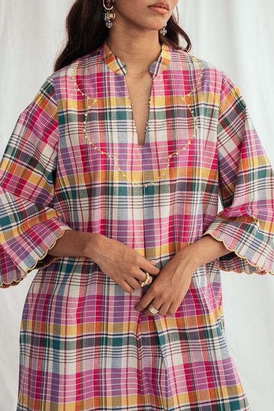 JODI Sherbet shift dress displayed on a model, showcasing a vibrant, sleeveless summer dress with a relaxed fit and knee-length design.