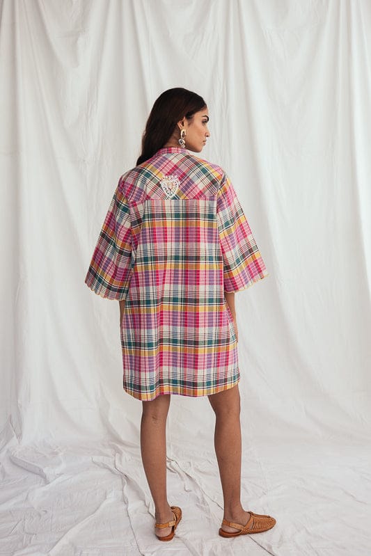 JODI Sherbet shift dress in bright color, sleeveless with a relaxed fit, displayed on a model in a fashion lookbook image.