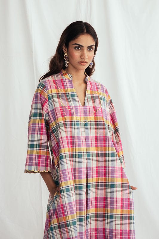 JODI Sherbet shift dress in vibrant colors, sleeveless design with a relaxed fit, showcased on a model in a fashion lookbook image.