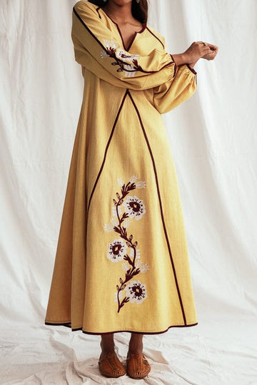 Aamras handloom peasant dress by JODI featuring intricate embroidery and traditional design, styled with a flowing silhouette.