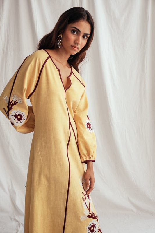 Aamras handloom peasant dress by JODI featuring vibrant, traditional fabric with flowing silhouette and intricate patterns.