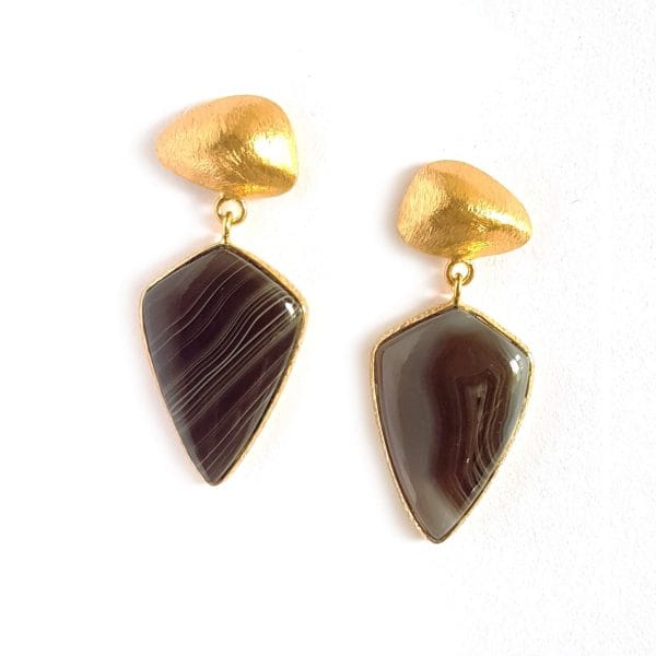 Bombaybirds Junon earrings featuring intricate gold-tone design and dangling elements, styled on a white background.