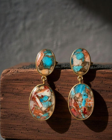 Bombaybirds Kandie earrings featuring elegant gold-tone hoops with intricate detailing and a stylish, modern design.