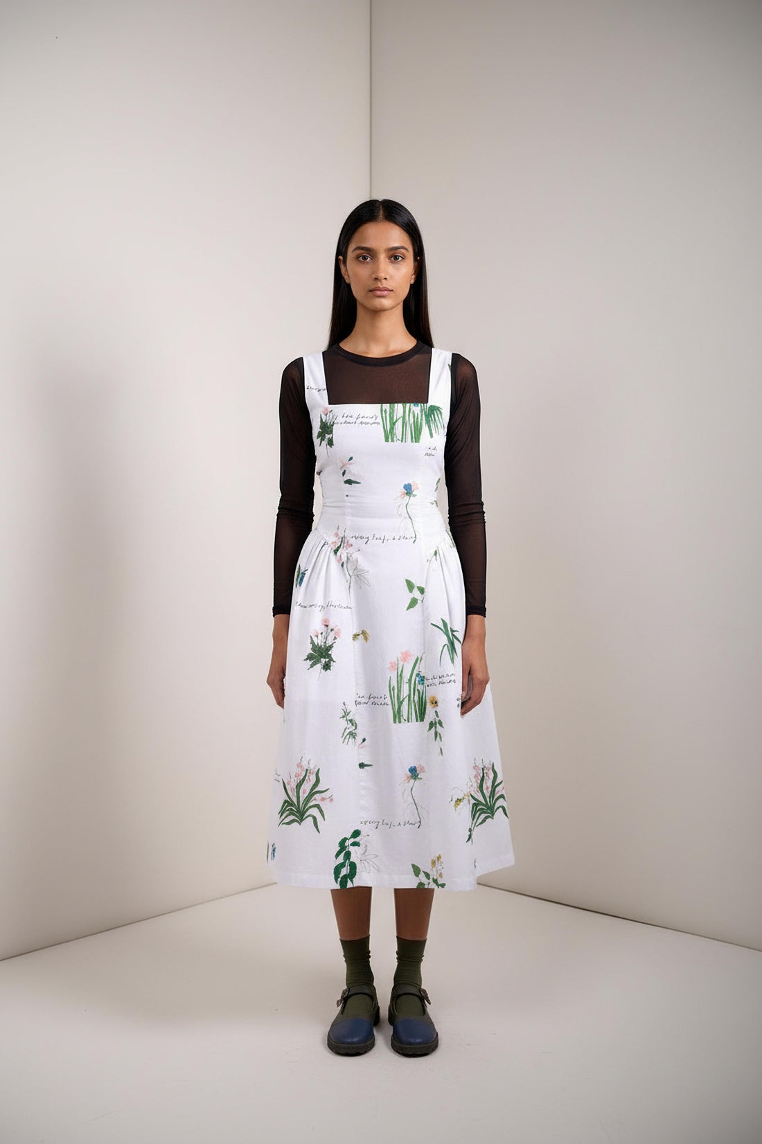 Doodlage Kyren printed dress with vibrant geometric patterns, sleeveless design, and lightweight fabric for a stylish, casual look.