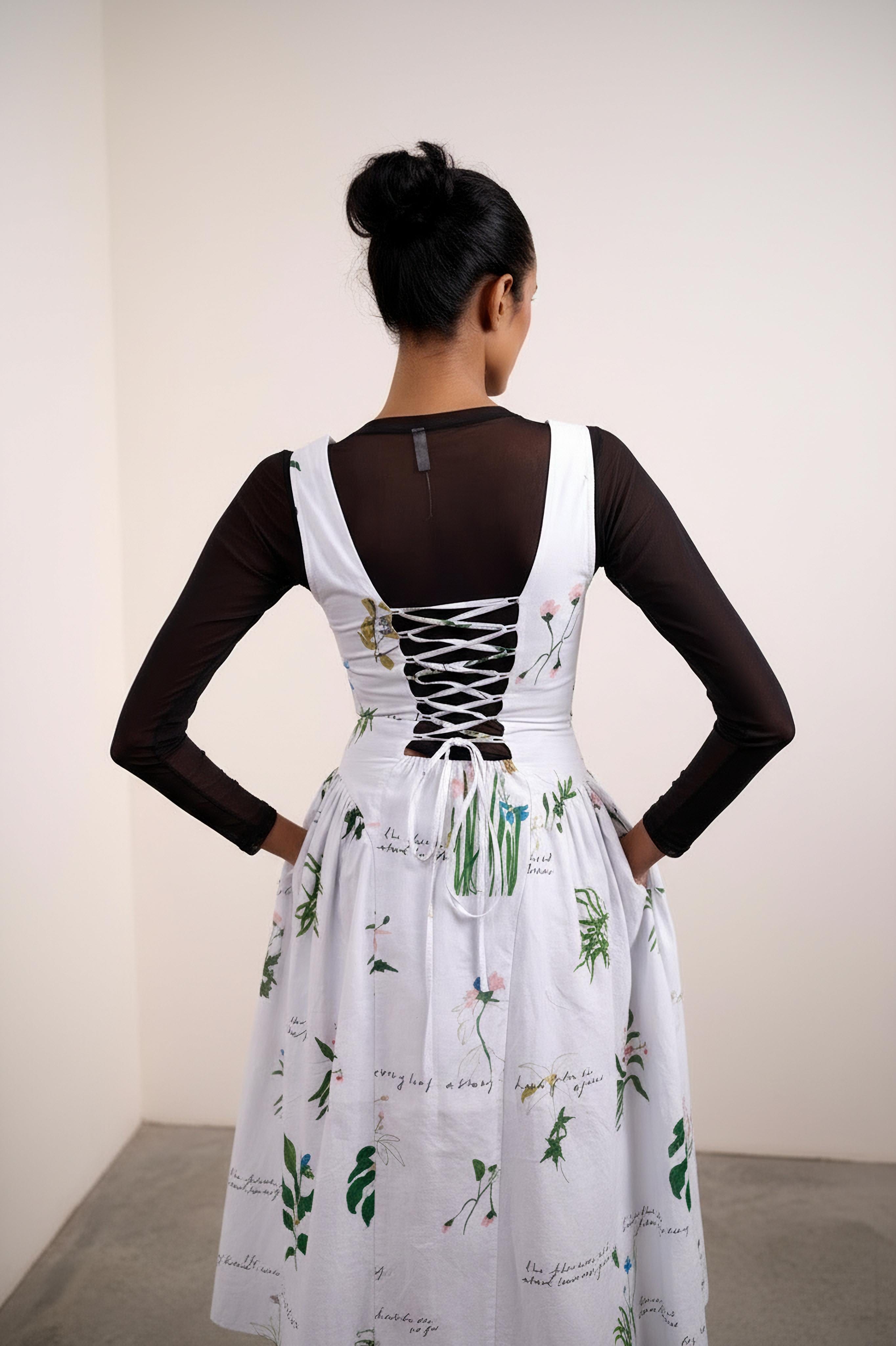 Kyren printed dress by Doodlage featuring a stylish, minimal design with vibrant patterns and a comfortable fit.