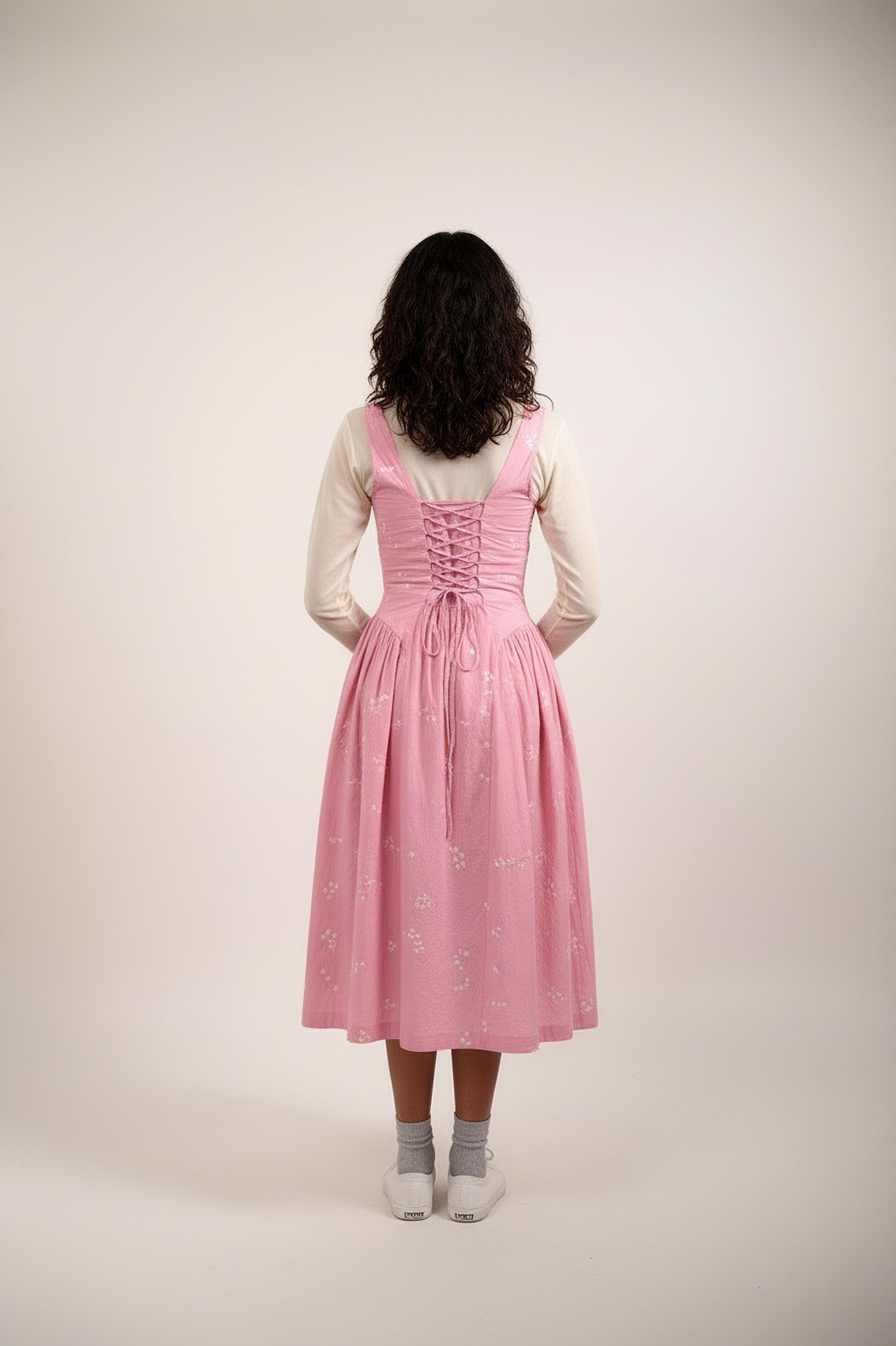 Back view of a Doodlage Kyren bandhani dress featuring traditional blue and white tie-dye patterns and a flowing silhouette.
