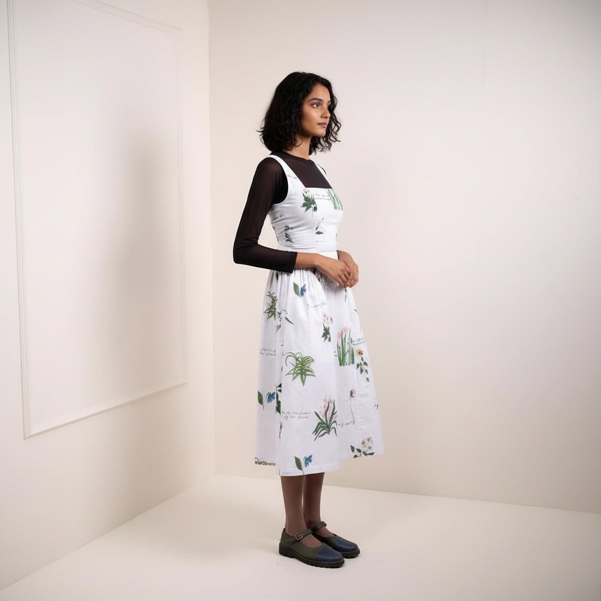 Kyren printed dress by Doodlage featuring colorful patterns and a comfortable fit, shown on a model with a natural pose.