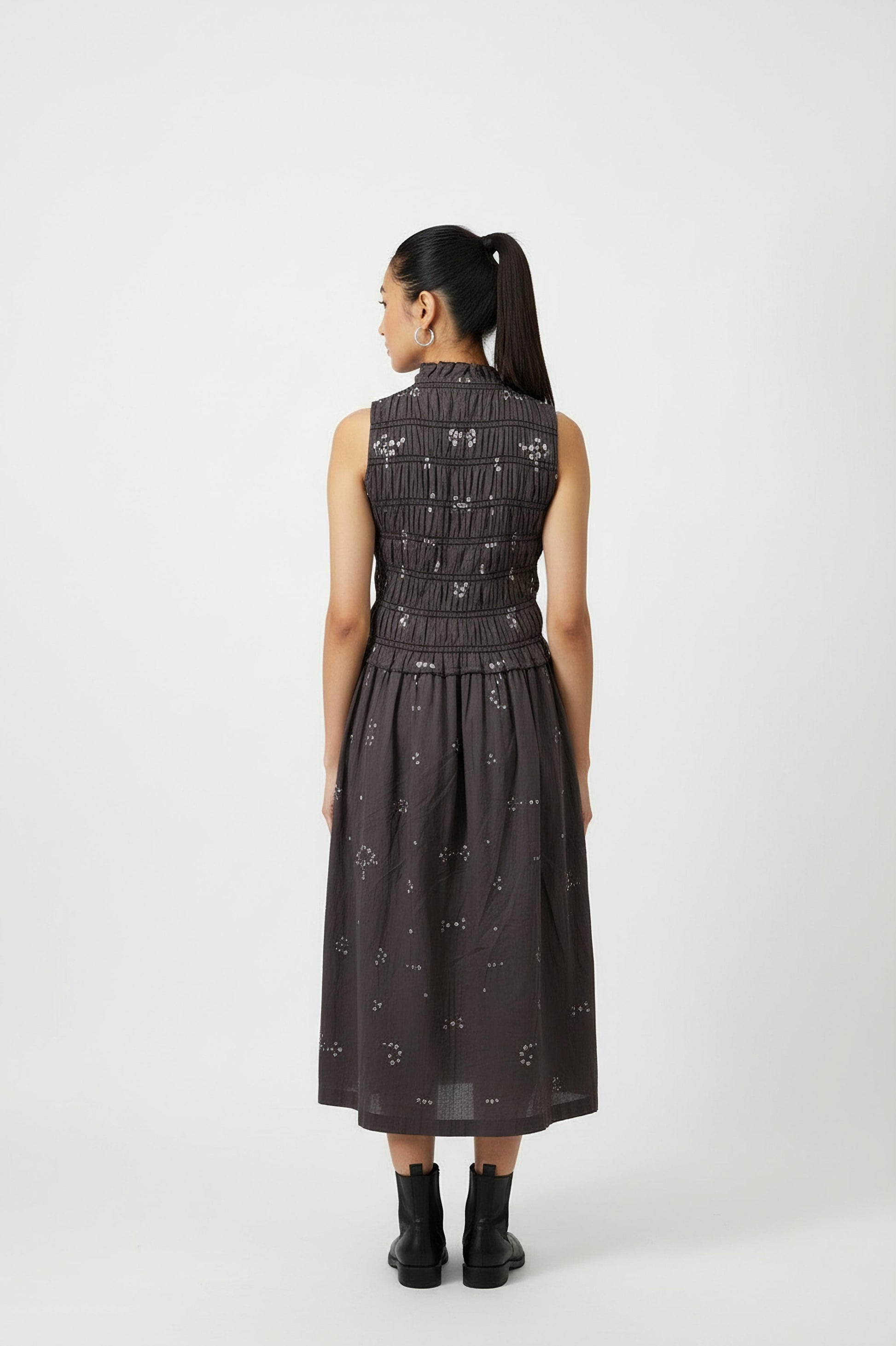 Midsummer bandhani smocked dress by Doodlage featuring vibrant patterns and a relaxed fit, displayed against a clean background.