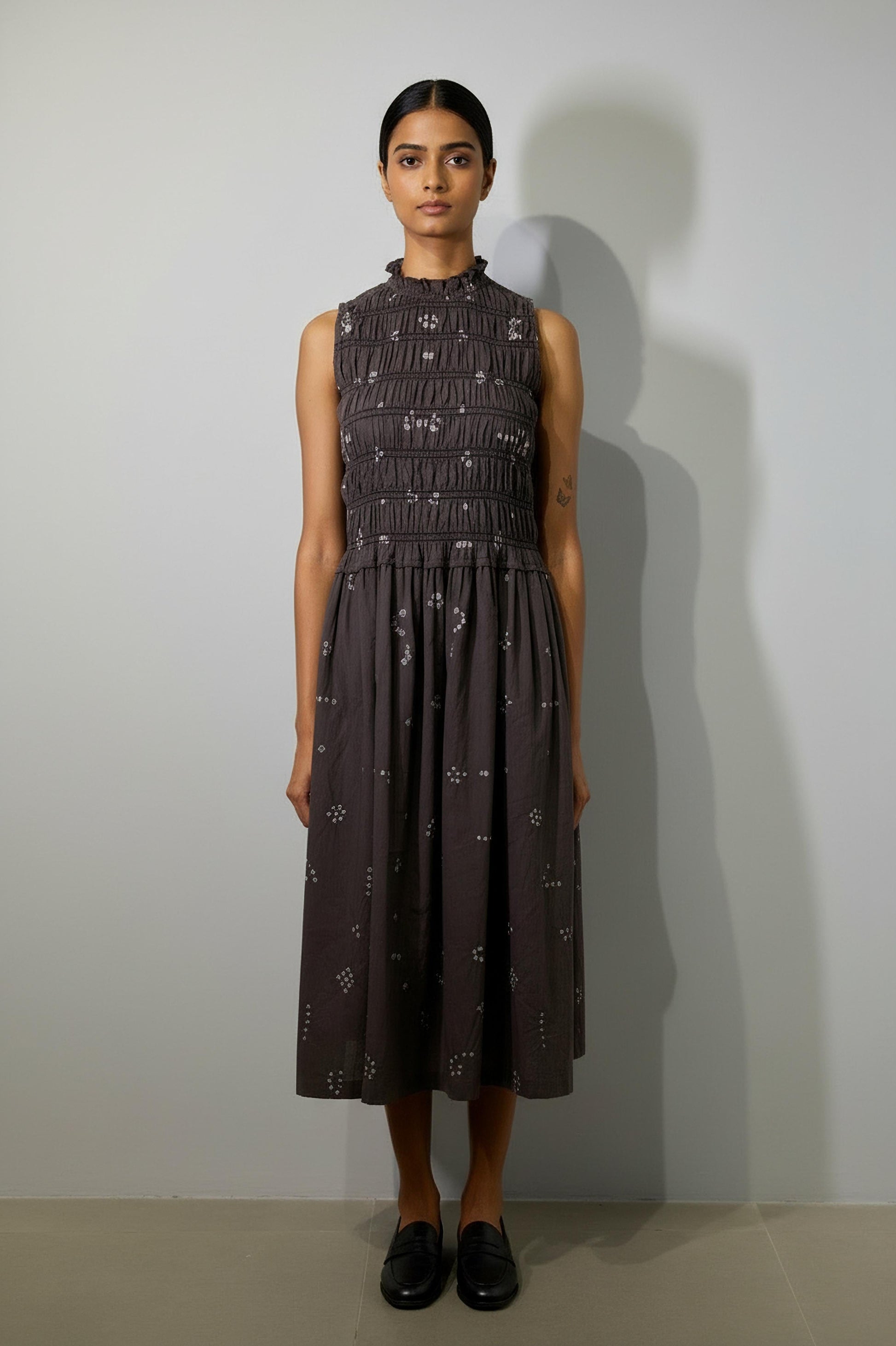 Doodlage Midsummer bandhani smocked dress with vibrant patterns and smocked bodice, displayed against a clean background.
