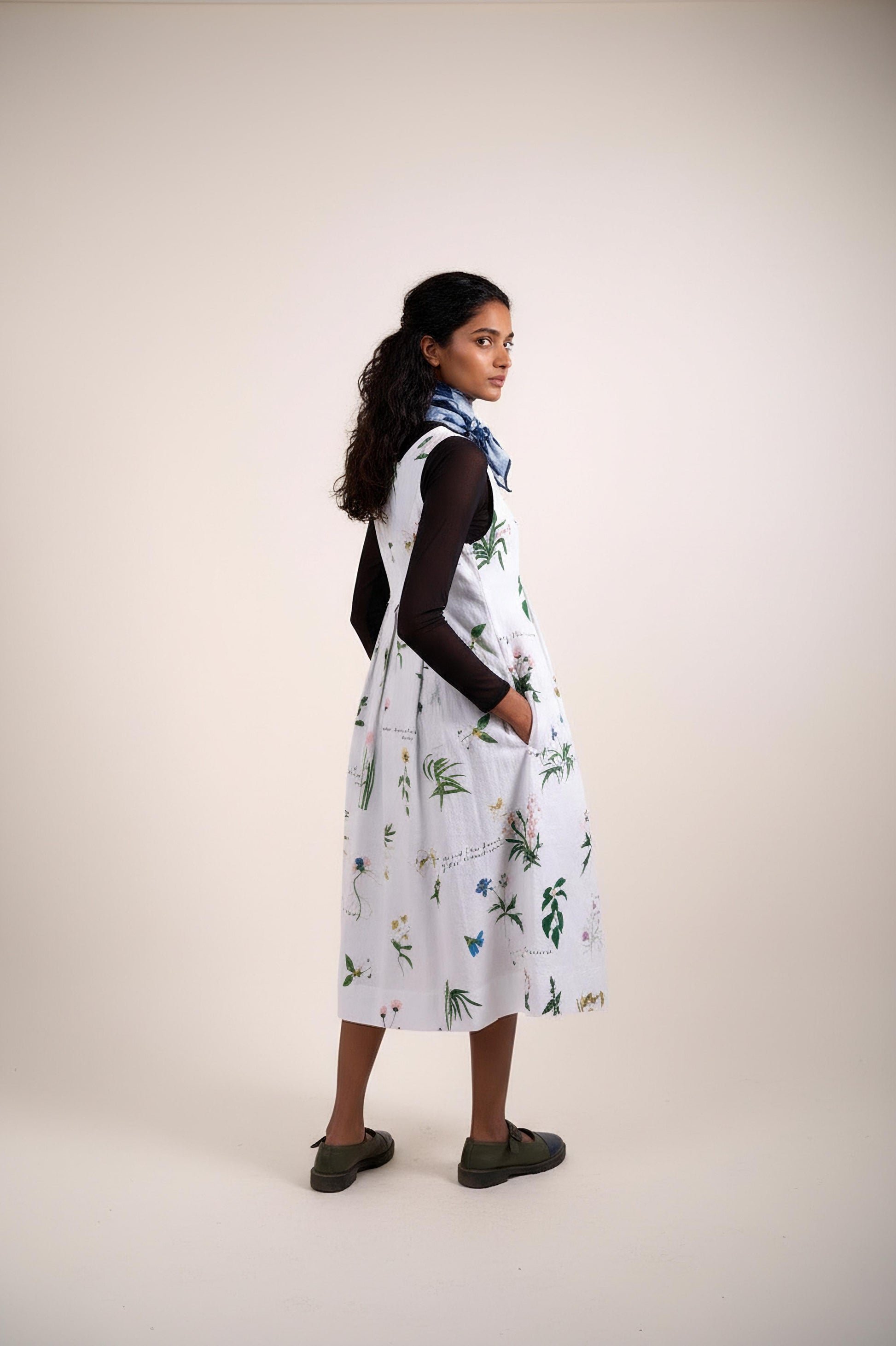 Doodlage Malaya printed dress with floral pattern, lightweight fabric, and fitted waist, displayed on a clean background.