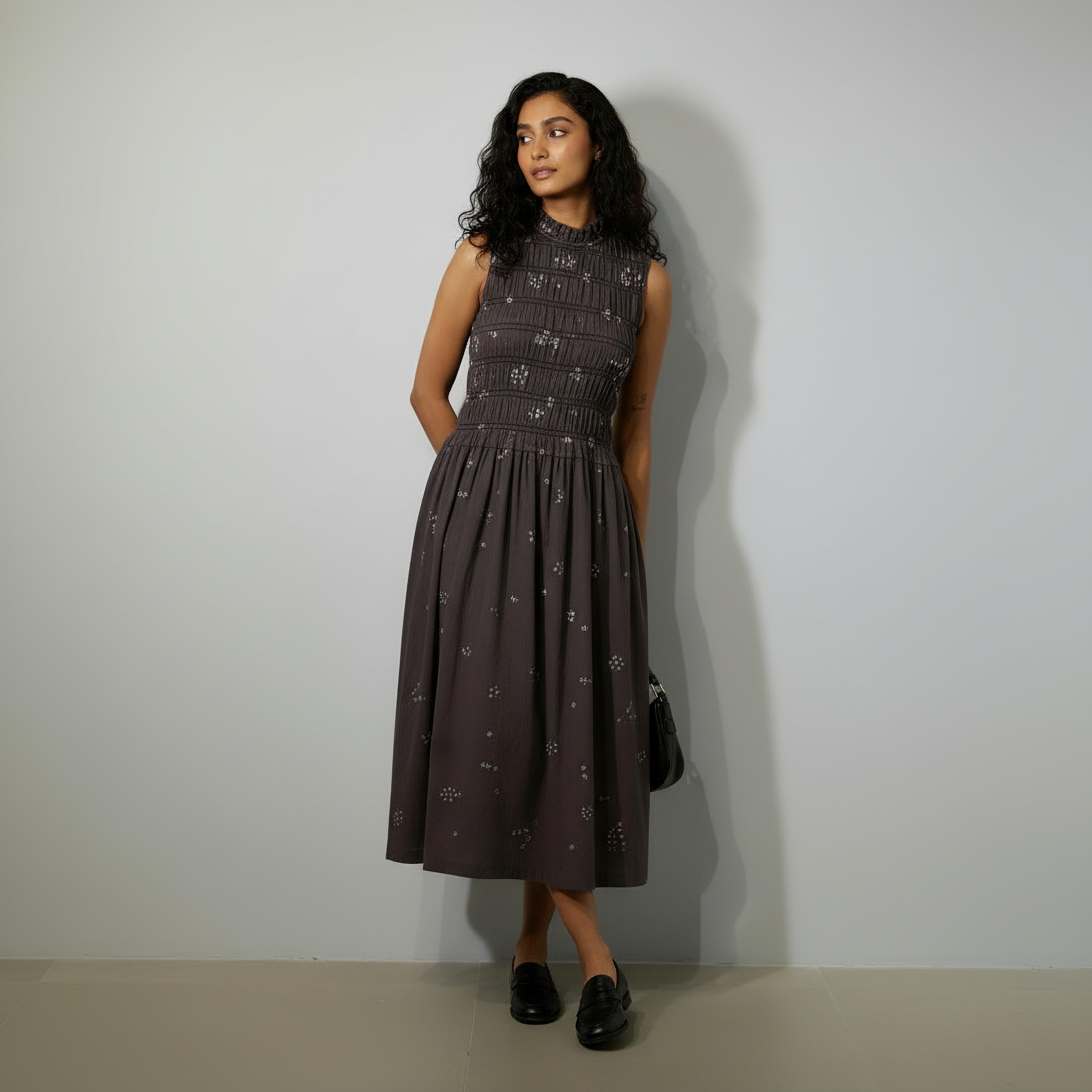 Doodlage Midsummer bandhani smocked dress, lightweight fabric with intricate traditional pattern and smocking detail, on a neutral background