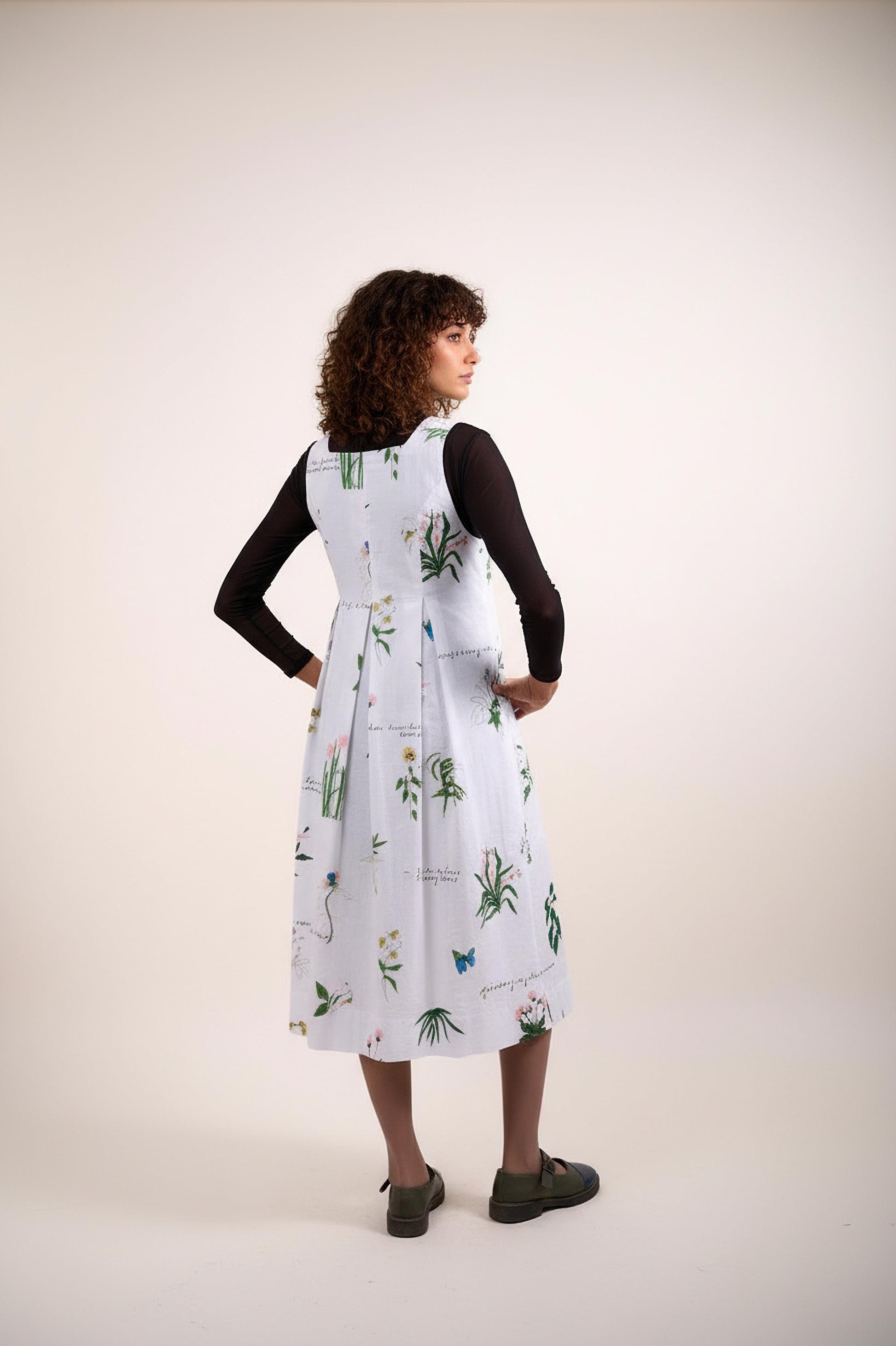 Doodlage Malaya printed dress on a model with a clean background, showcasing the vibrant pattern and stylish design.