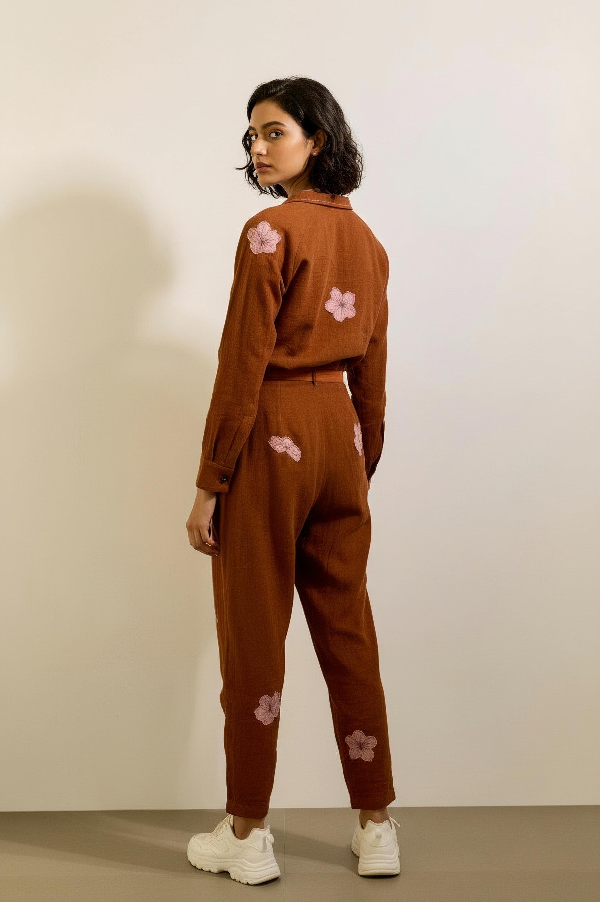 Doodlage Hearth jumpsuit with clean background, showing a stylish, eco-friendly one-piece in natural fabric with a relaxed fit.