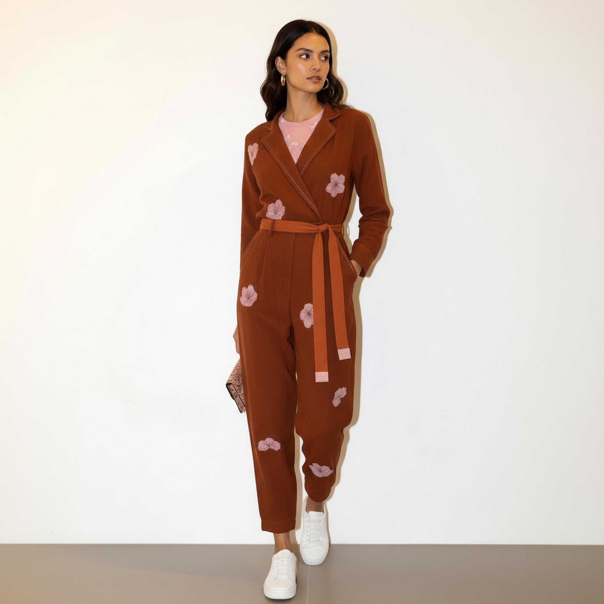 Doodlage Hearth jumpsuit with a clean background, showcasing its stylish, casual fit and unique fabric details.