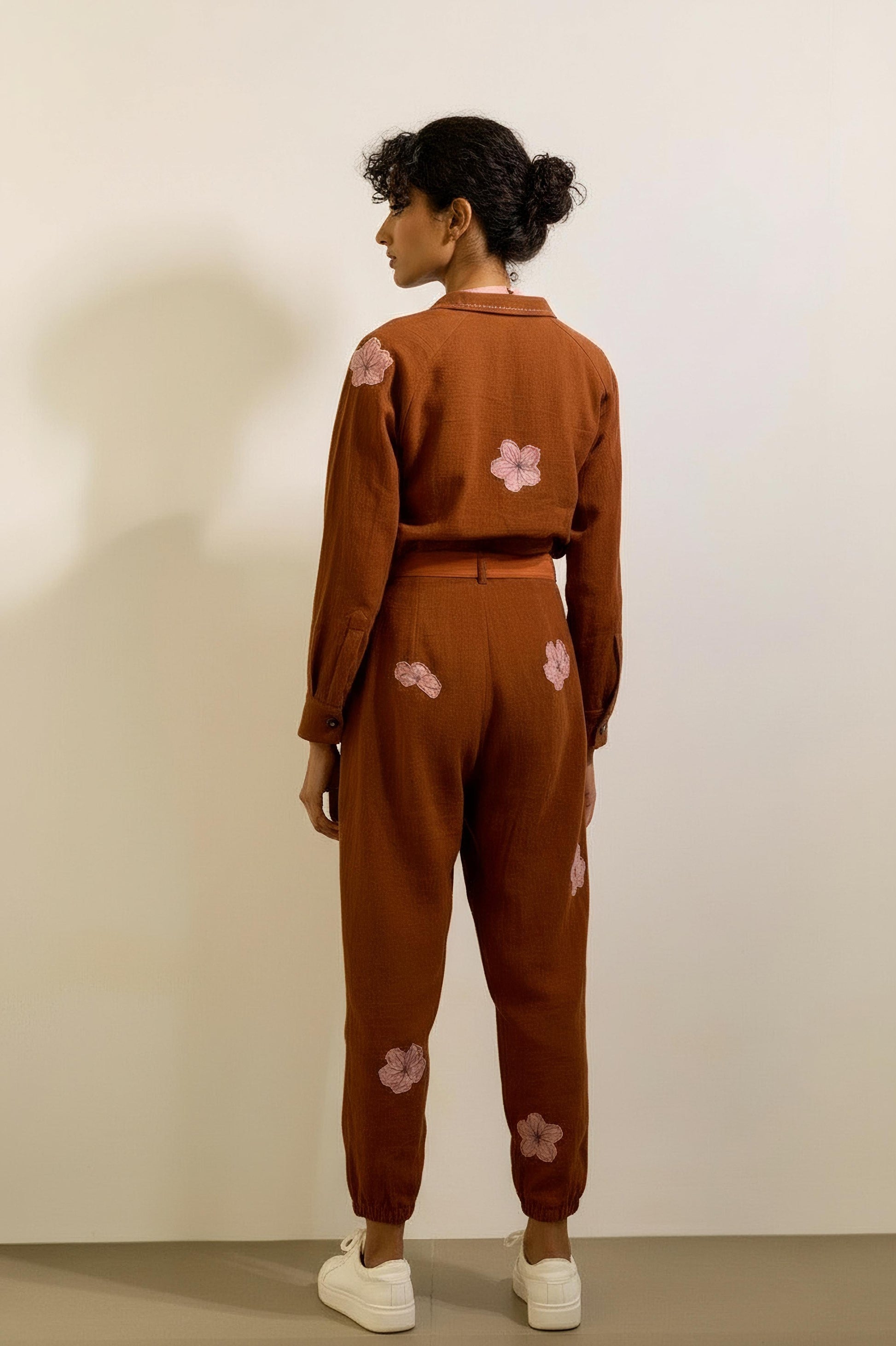 Doodlage Hearth jumpsuit displayed against a clean background, showcasing the relaxed fit and stylish design of the casual women's jumpsuit.