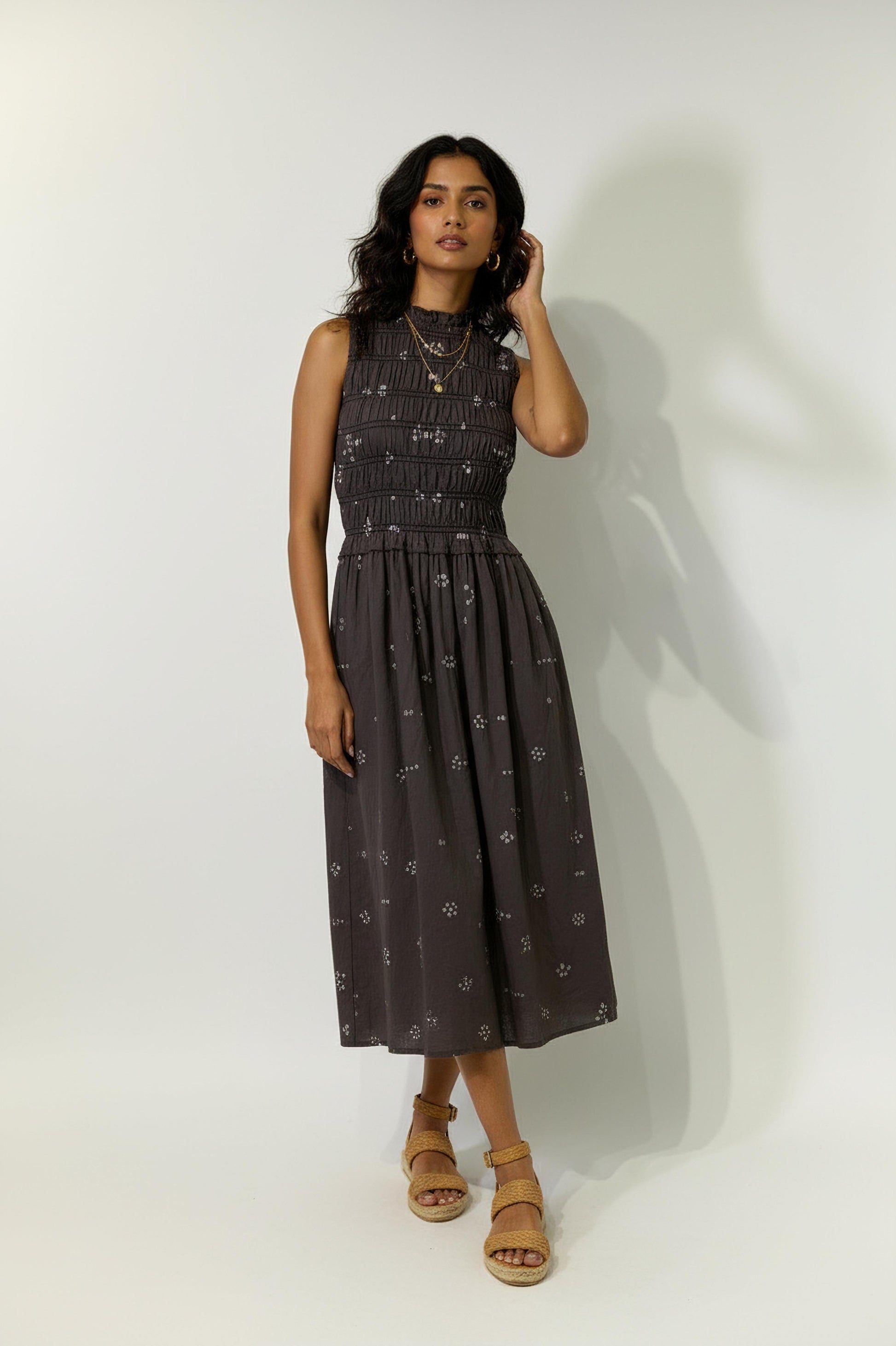 Doodlage Midsummer bandhani smocked dress displayed on a model with a clean background, highlighting its vibrant print and relaxed fit.