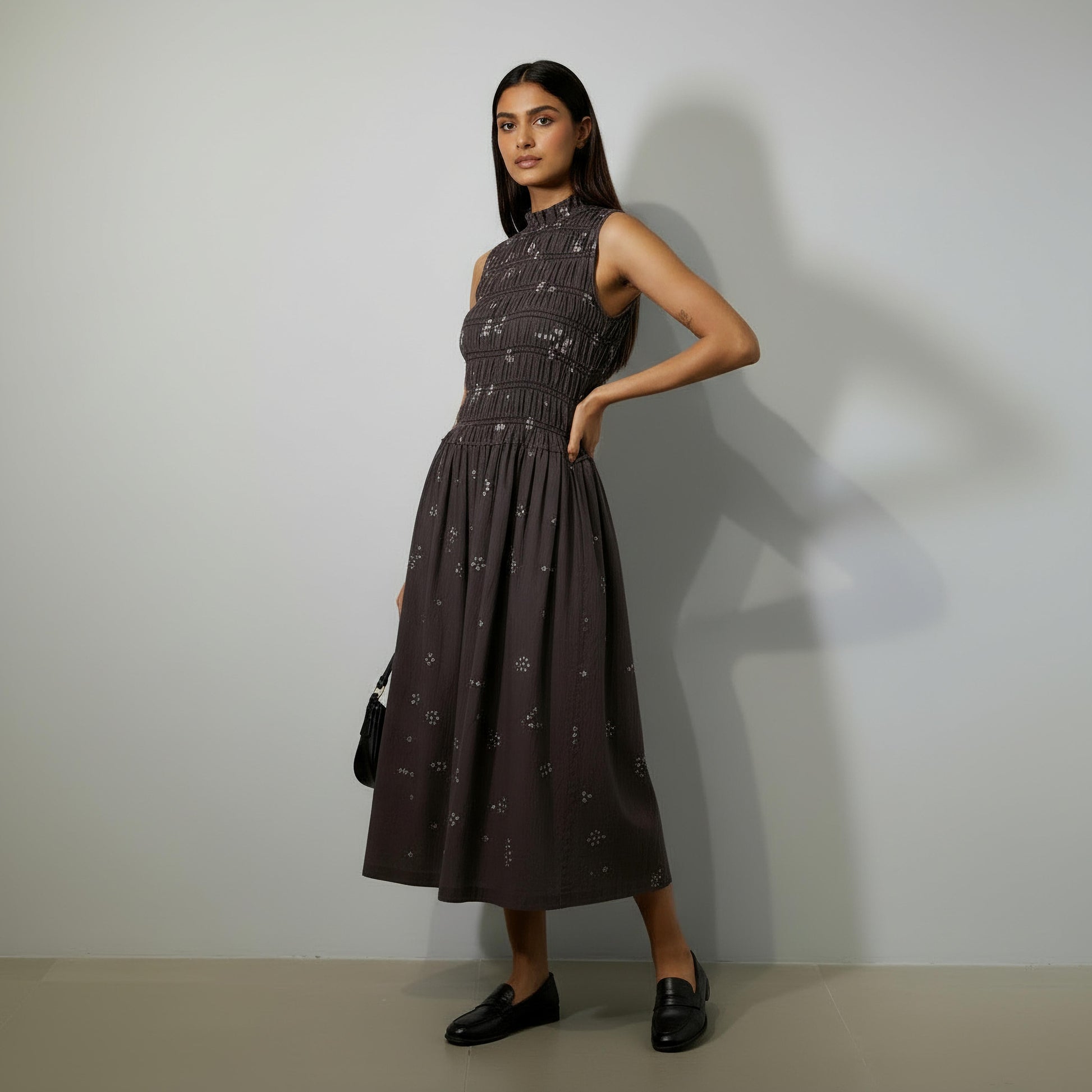 Doodlage Midsummer bandhani smocked dress with vibrant patterns and ruffled details, styled on a clean background.