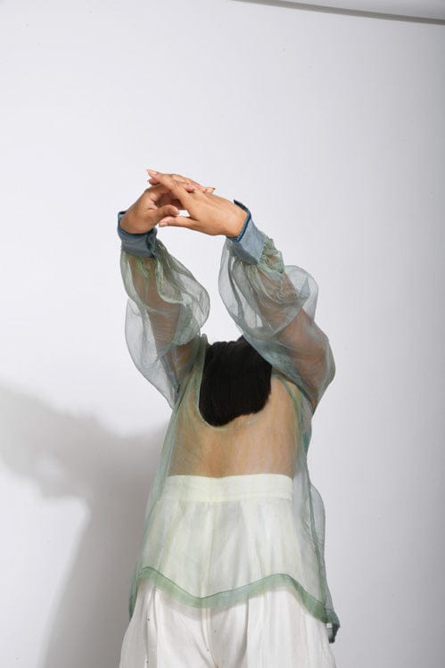 Sea waves patterned organza shirt by Theloomart, featuring a flowy, lightweight fabric with a vibrant wave design.