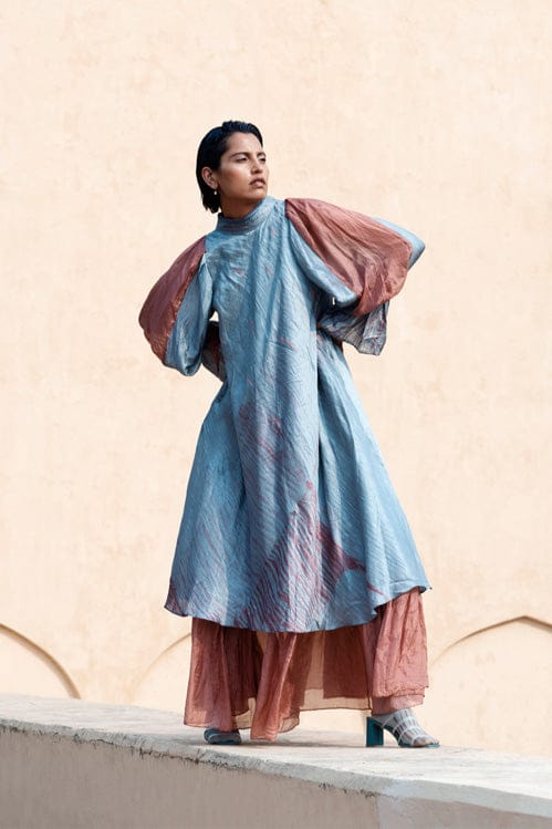 Blush and teal dress by Theloomart featuring a flowing fabric and stylish design, displayed on a mannequin.