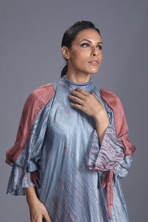 Blush and teal dress by Theloomart featuring a stylish, flowy design with elegant fabric and intricate pattern details.