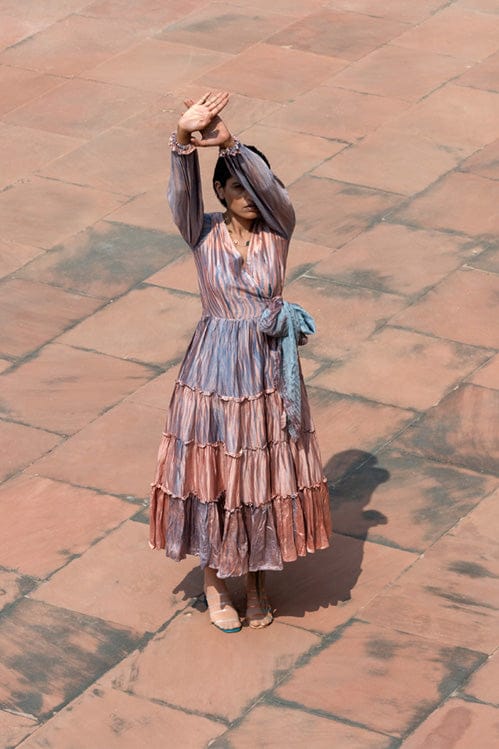 Elegant icy rust-colored dress by Theloomart featuring a flowing silhouette and stylish design.